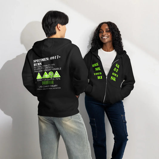 Two people modeling black full zip hoodies with neon green edgy text and graphic designs