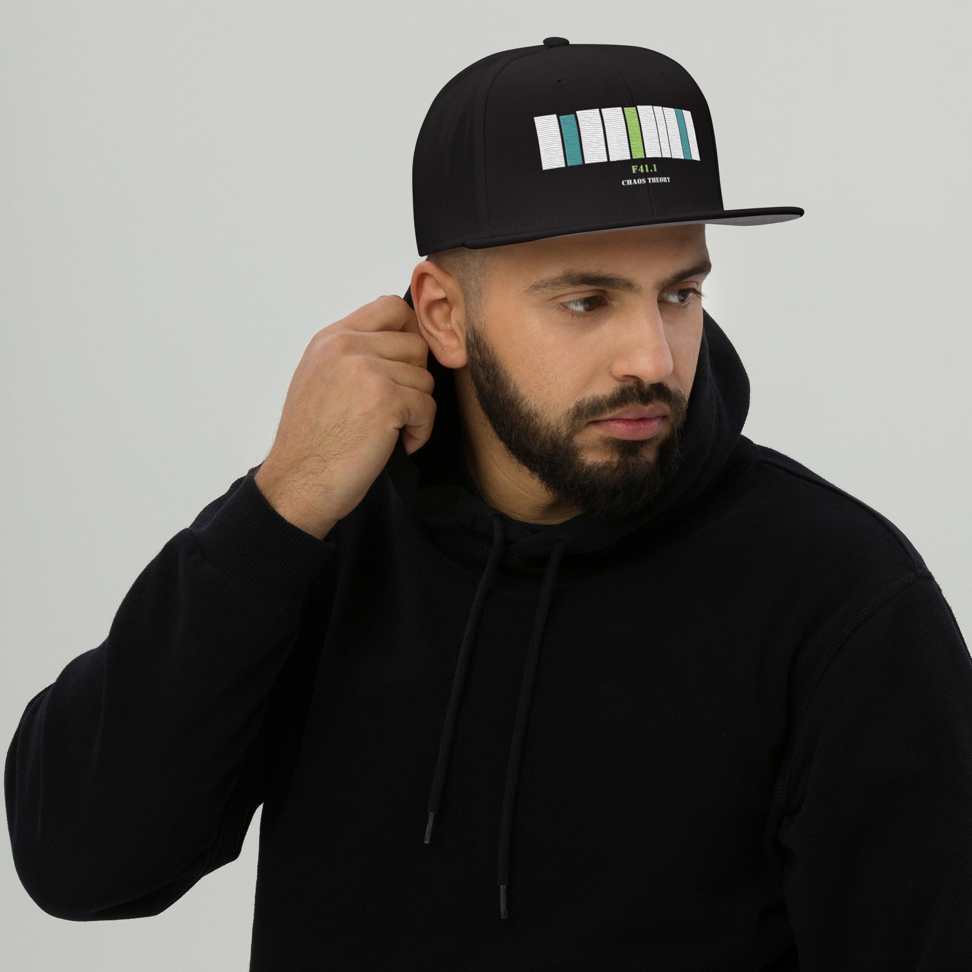 Model wearing DSM-5 Barcode Snapback Hat with minimalist mental health streetwear styling