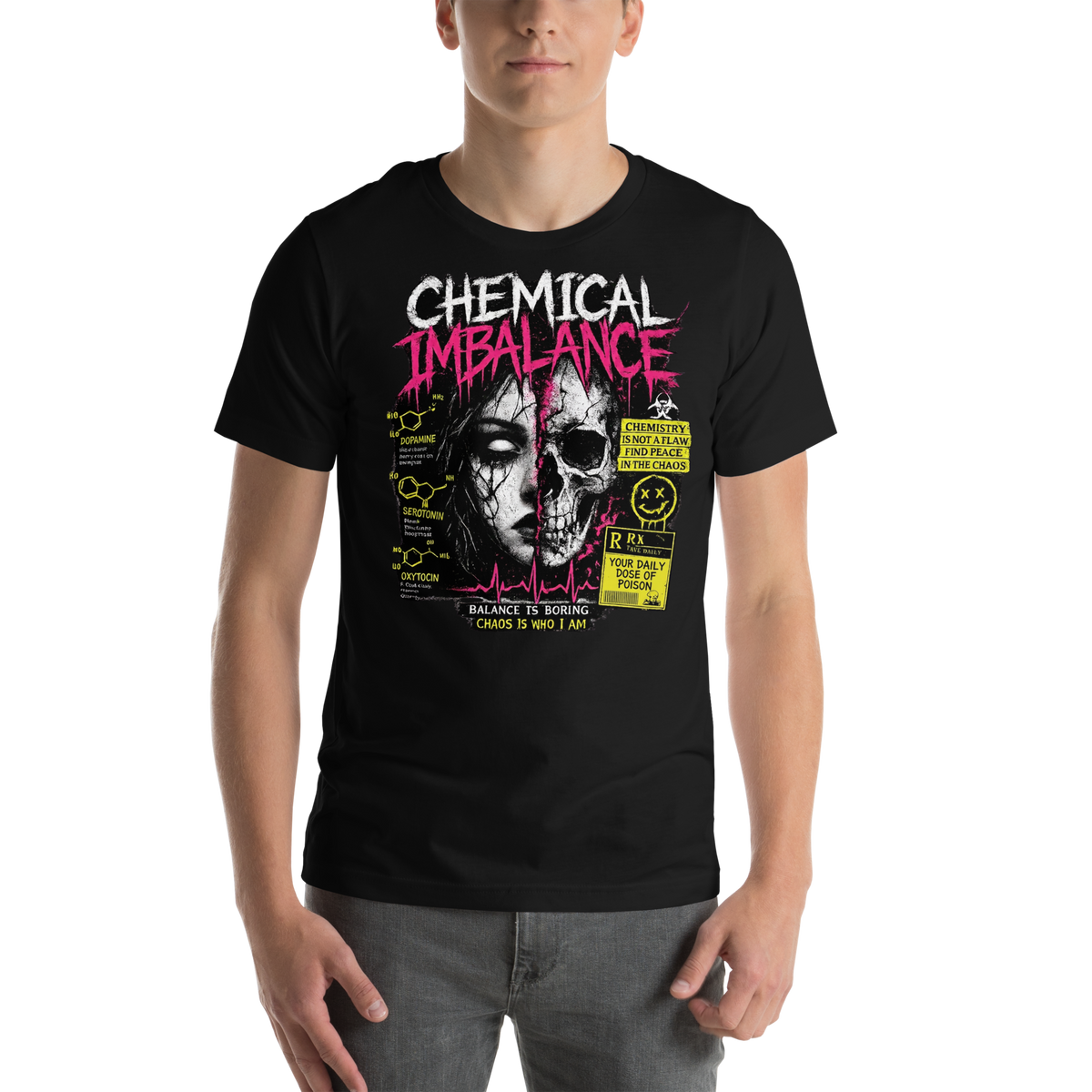 Model wearing black Chaotic Peace graphic tee with pink Chemical Imbalance lettering, split face and skull artwork, and toxic yellow details.