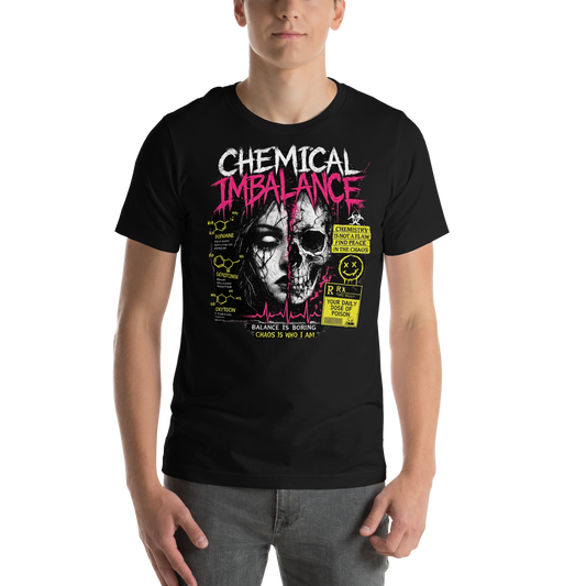 Model wearing black Chaotic Peace graphic tee with pink Chemical Imbalance lettering, split face and skull artwork, and toxic yellow details.
